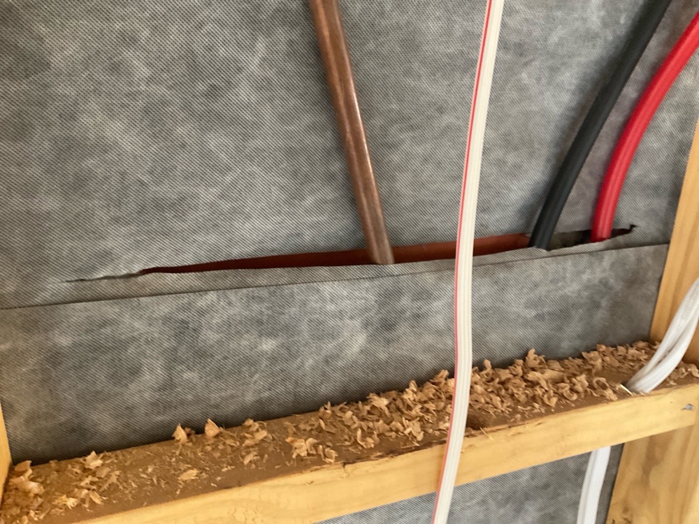 Sarking laps not meeting the required overlap or seal, found during a lock-up inspection in Mickleham