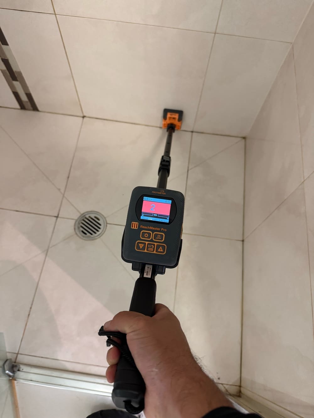 Raised moisture readings in a shower, found during a pre-purchase inspection in South Yarra